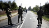 Soldiers patrol the street, following violations of Polish airspace during a Russian attack on Ukraine, in Wyryki
