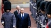 Kazakhstan's President Nursultan Nazarbayev (C) and Britain's Prince Philip review an honour guard at Buckingham Palace in London, Britain November 4, 2015. REUTERS/Stefan Wermuth