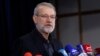 Ali Larijani talks to reporters after registering his name as a candidate for the June 2024 presidential elections in Tehran, on May 31, 2024. 